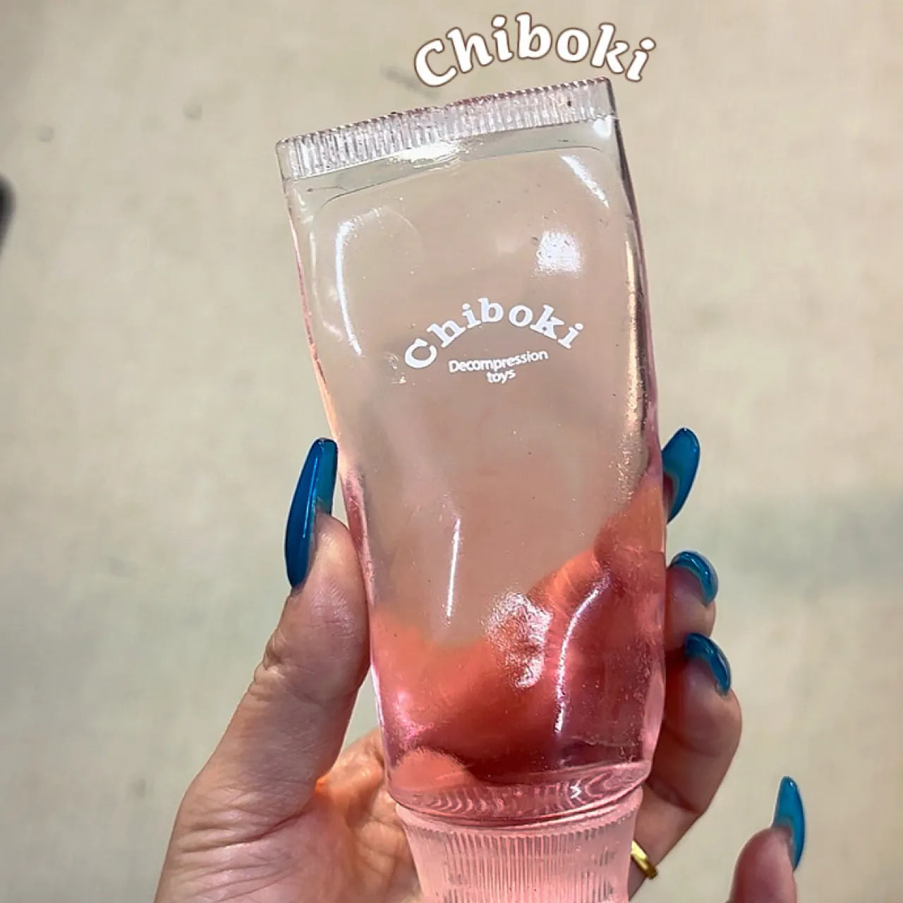 Peach Toothpaste Tube Squishy - Soft & Malleable Squeeze