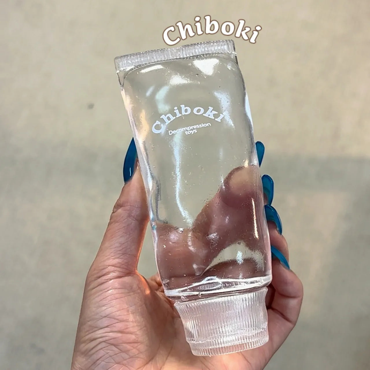Peach Toothpaste Tube Squishy - Soft & Malleable Squeeze
